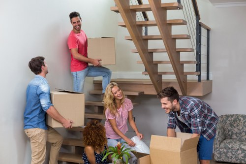 Students moving boxes during a local relocation in Collierswood
