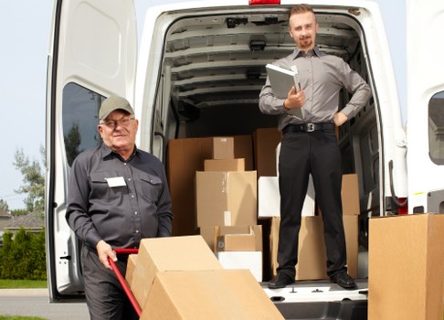 Moving truck and boxes for a transparent house move quote in Colliers Wood