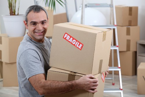 Moving boxes labeled and arranged by professionals in Collierswood