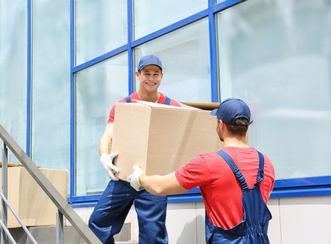 Packed apartment boxes showing load-based moving rates in Collierswood