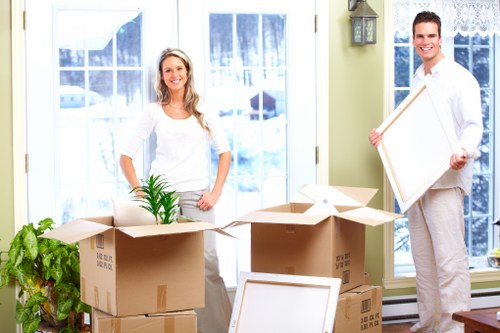Professional movers handling furniture during a Collierswood relocation